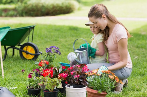 Team member preparing accessible materials and communicating options for garden maintenance